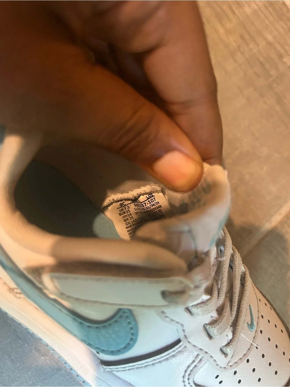 Nike Kids White Sneakers with Light Blue Accents